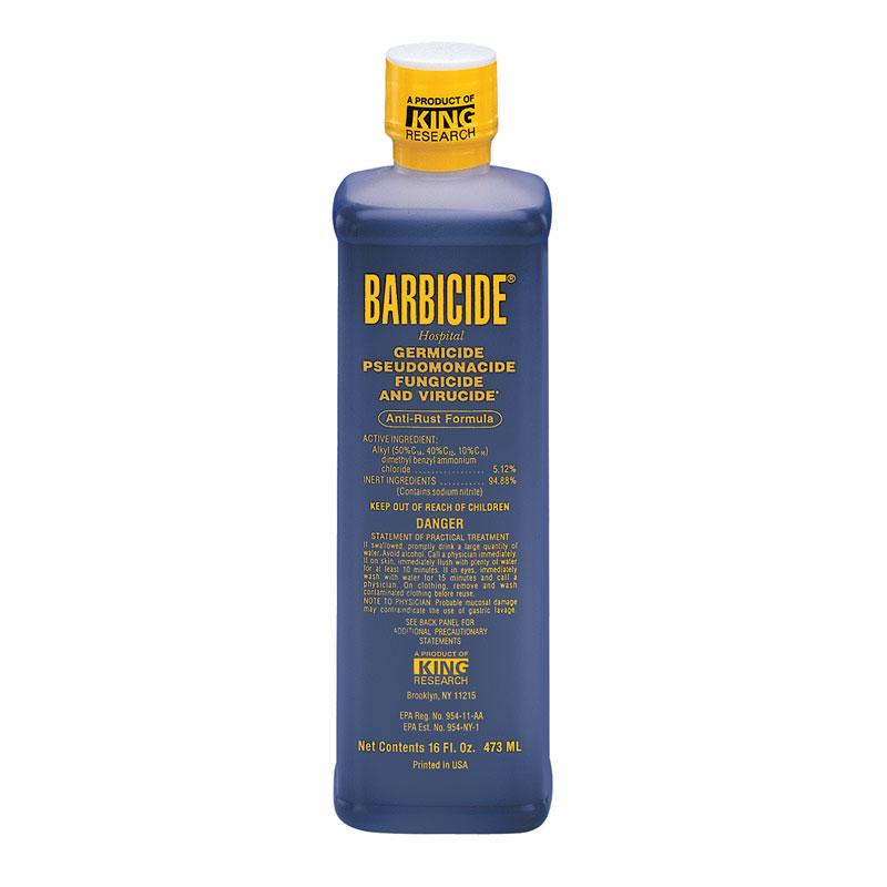 Barbicide Concentrate 473ml bottle used to disinfect barber tools in a sanitising jar