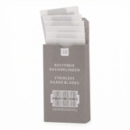 Box of stainless razor blades with visible text on a white background